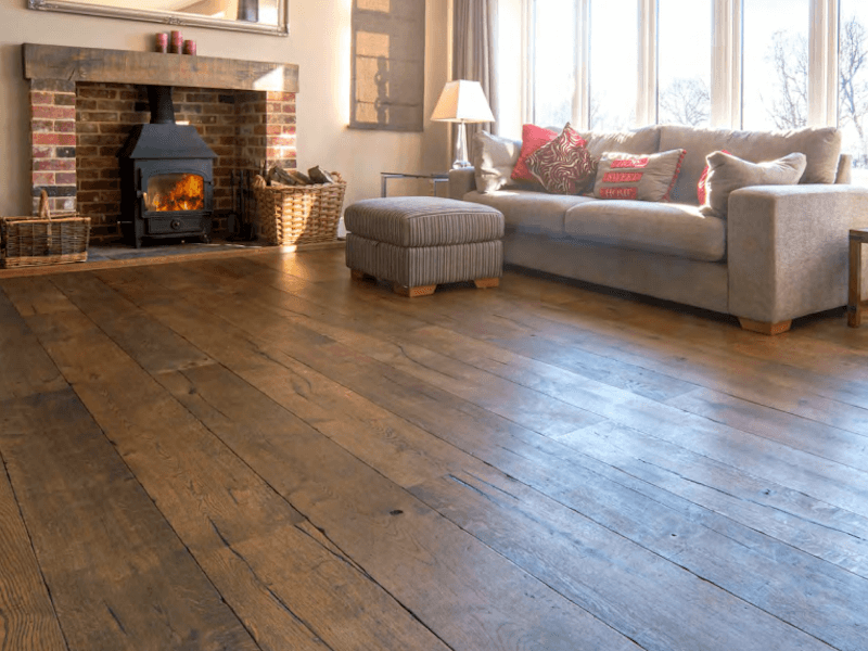 Lounge with fireplace and beautiful oak flooring