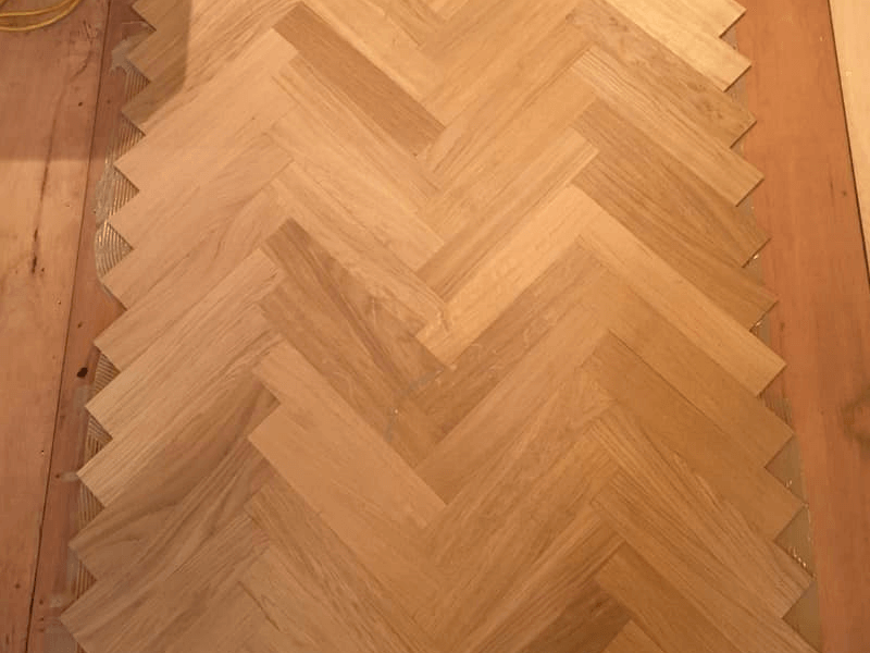 Parquet flooring being installed